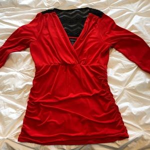 Red surplice lace back top